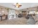 Spacious living area with comfortable seating, stylish rug, and ample natural light at 2087 59Th N St, Clearwater, FL 33760