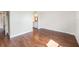 This bedroom features wood floors, closet space and an en suite bathroom at 2614 Cove Cay Dr # 301, Clearwater, FL 33760