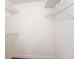 Spacious walk-in closet featuring wire shelving for optimal storage and organization at 2614 Cove Cay Dr # 301, Clearwater, FL 33760