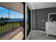 Balcony view of the ocean with a lounge chair and a partial view of the main bedroom at 2700 Bayshore Blvd # 9209, Dunedin, FL 34698