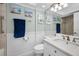 Charming bathroom featuring artwork, a classic mirror, and a toilet next to the vanity at 2700 Bayshore Blvd # 9209, Dunedin, FL 34698