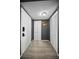 Neutral hallway with tile floor, leading to unit door and closets with great storage at 2700 Bayshore Blvd # 9209, Dunedin, FL 34698