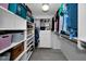 Spacious walk-in closet with ample storage space, shelving, and organized clothing racks at 2700 Bayshore Blvd # 9209, Dunedin, FL 34698