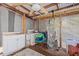 Enclosed porch featuring a ceiling fan and a hammock at 2819 N 75 St, Tampa, FL 33619