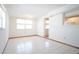 Bright living room with tile floors and large windows at 2936 39Th N Ave, St Petersburg, FL 33714