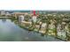 Waterfront condos, houses and docks are seen in this aerial view of the property and surrounding area at 30 Turner St # 502, Clearwater, FL 33756