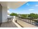 Relaxing condo balcony featuring a table, seating and an open view of the neighborhood at 30 Turner St # 502, Clearwater, FL 33756