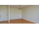 Simple dining area with laminate flooring, basic lighting, and white walls, adjacent to the kitchen at 30 Turner St # 502, Clearwater, FL 33756