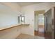 Bright kitchen with tile floors and an open breakfast bar connecting to the adjacent living area at 30 Turner St # 502, Clearwater, FL 33756