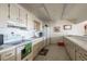 Functional kitchen with appliances offers a space to prepare meals and snacks at 30 Turner St # 502, Clearwater, FL 33756