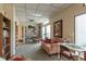 Cozy library features bookshelves, a table, and a comfortable seating area at 30 Turner St # 502, Clearwater, FL 33756