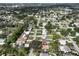 Aerial view of neighborhood with tree-lined streets in a quiet neighborhood at 3241 Williamsburg St, Sarasota, FL 34231