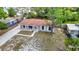 Aerial view of a charming one-story home with a well-maintained front yard and landscaping at 3407 N 48Th St, Tampa, FL 33605