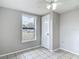 Bedroom featuring a ceiling fan and a large window at 3407 N 48Th St, Tampa, FL 33605