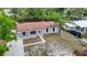 Aerial view of a charming one-story home with a well-maintained front yard and landscaping at 3407 N 48Th St, Tampa, FL 33605
