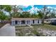 Charming single-story home features a covered porch and well-maintained front yard at 3407 N 48Th St, Tampa, FL 33605