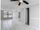 Bright living room with tile flooring and large window for lots of natural light at 3407 N 48Th St, Tampa, FL 33605