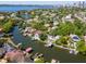 Breathtaking aerial view of luxurious waterfront homes with boat access, offering a scenic and private residential experience at 511 Erie Ave, Tampa, FL 33606