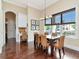 Elegant dining room with wood floors, water views, and stylish furnishings at 511 Erie Ave, Tampa, FL 33606