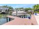 Waterfront property with a private dock and boat lift for convenient water access at 511 Erie Ave, Tampa, FL 33606