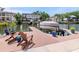 Beautiful outdoor dock featuring chairs and a boat lift, overlooking the waterway at 511 Erie Ave, Tampa, FL 33606