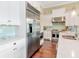 Bright kitchen features stainless steel appliances, including a refrigerator and range at 511 Erie Ave, Tampa, FL 33606