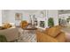 Inviting living room with a cozy fireplace, stylish furnishings, and an elegant area rug at 615 14Th Ne Ave, St Petersburg, FL 33701