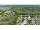 Aerial view of the community showcasing the property's location near lush greenery and scenic surroundings at 7816 Citrus Blossom Dr, Land O Lakes, FL 34637