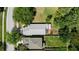 Aerial view showcasing the property's layout, backyard oasis, and proximity to lush green spaces at 7816 Citrus Blossom Dr, Land O Lakes, FL 34637