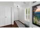 Bright foyer with wood flooring, bench seating, and natural light at 7816 Citrus Blossom Dr, Land O Lakes, FL 34637