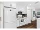 Functional kitchen area with white cabinets, modern appliances, and ample storage space for convenience at 7816 Citrus Blossom Dr, Land O Lakes, FL 34637