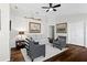 Cozy living room features hardwood floors, neutral paint, and comfortable seating at 7816 Citrus Blossom Dr, Land O Lakes, FL 34637