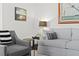 Comfortable living room with plush seating, elegant decor, and a warm ambiance at 7816 Citrus Blossom Dr, Land O Lakes, FL 34637