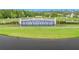 Community entrance featuring the Epperson name over a water fountain and manicured landscaping at 8749 Parsons Hill Blvd, Wesley Chapel, FL 33545