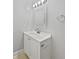 Bathroom features a modern vanity with brushed hardware, mirror, and lighting at 9481 Highland Oak Dr # 703, Tampa, FL 33647