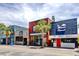 Charming street view showcasing local businesses, adding character and vibrancy to the neighborhood at 100 Glennes Ln # 207, Dunedin, FL 34698