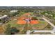 An aerial shot of the baseball fields with the buildings and park in the surrounding areas at 11817 Mango Cross Ct, Seffner, FL 33584