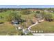 An aerial view of a neighborhood park that features walkways, shade, and play areas at 11817 Mango Cross Ct, Seffner, FL 33584