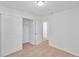 Bedroom with neutral carpet, white walls, recessed lighting, and closet space at 11817 Mango Cross Ct, Seffner, FL 33584
