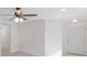 Cozy entryway featuring fresh white walls, carpeted floors, and direct access to the front door at 11817 Mango Cross Ct, Seffner, FL 33584