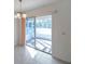 Open patio with brick floors can be accessed through sliding glass doors at 11817 Mango Cross Ct, Seffner, FL 33584