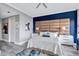 Bedroom featuring an oversized headboard and ample natural light at 130 Riviera Dunes Way # 203, Palmetto, FL 34221