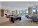 Inviting resident lounge with comfortable seating, scenic views, and a community atmosphere at 130 Riviera Dunes Way # 203, Palmetto, FL 34221
