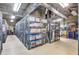Well-lit and organized storage room with secure wire cages for residents' convenience and safety at 130 Riviera Dunes Way # 203, Palmetto, FL 34221