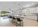 Spacious open-concept kitchen with an island, stainless appliances, and seamless connection to the living area at 1423 W Wood St, Tampa, FL 33604