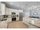 Well-appointed kitchen with stainless steel appliances, a center island, and ample counter space for cooking at 1423 W Wood St, Tampa, FL 33604