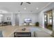 Spacious living room with an open floor plan is perfect for entertaining and features lots of natural light at 1423 W Wood St, Tampa, FL 33604