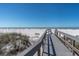 Picturesque boardwalk with ocean views, offering serene beach access at 200 120Th W Ave # 3A, Treasure Island, FL 33706