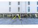 Car park under the house with ample space and access to stairs and elevator at 200 120Th W Ave # 3A, Treasure Island, FL 33706
