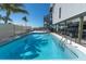 Sparkling pool with clear blue water, a ladder and lots of space at 200 120Th W Ave # 3A, Treasure Island, FL 33706